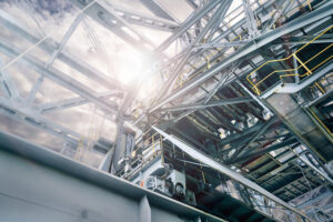 SRC鋼骨混凝土結構的示意圖或實景特寫，強調鋼構彈性與混凝土剛性結合的穩健耐震工藝